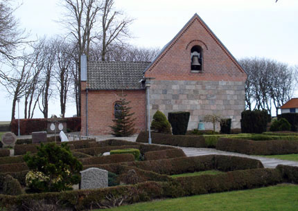 Gravsten på Komdrup kirkegård. Hellum herred. Aalborg amt.